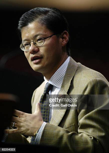Jerry Yang, Cofounder and Chief Yahoo, Yahoo! Inc. Gestures as he gives the opening keynote address at the Boston College Finance Conference 2004,...