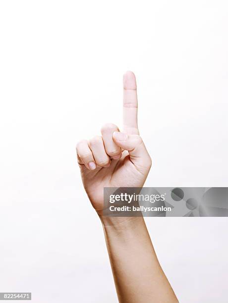 hand with finger held up - finger bildbanksfoton och bilder