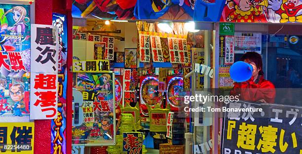 pachinko and game center shibuya tokyo - multi coloured megaphone stock pictures, royalty-free photos & images