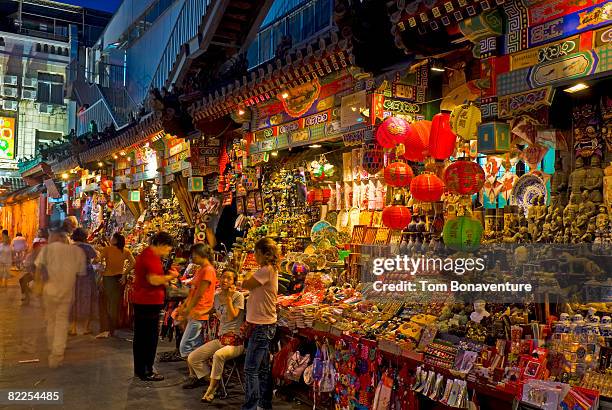 market in wanfujing shopping street beijing - wangfujing stock pictures, royalty-free photos & images