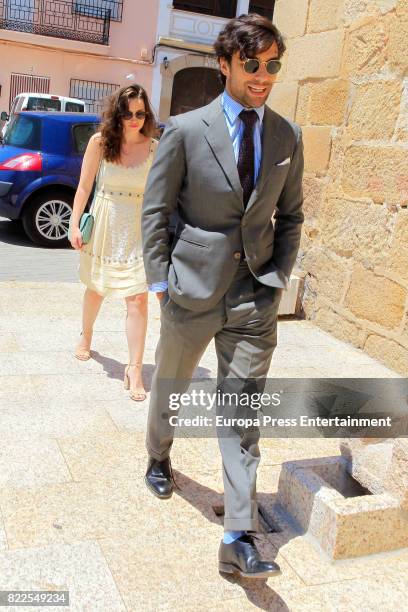 Diego Osorio and Jordan Joy Hewson attend the First Communion of Diego Osorio's nephew on July 3, 2017 in Caceres, Spain.