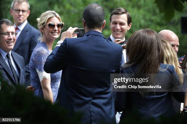 Members of the official Lebanese delegation and journalists make photographs of President Donald Trump's daughter Ivanka Trump and her husband,...