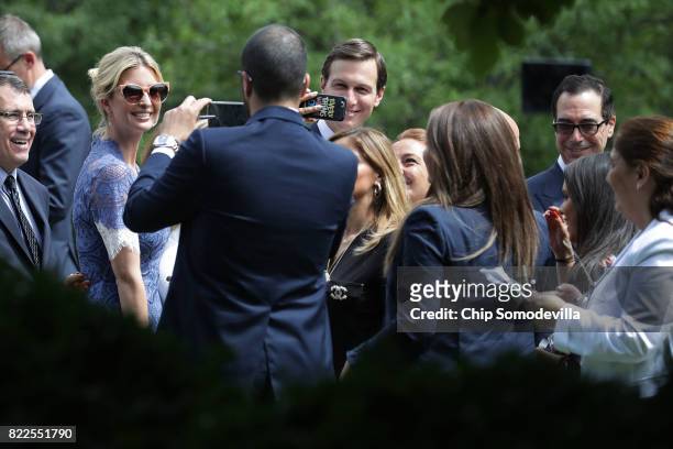 Members of the official Lebanese delegation and journalists make photographs of President Donald Trump's daughter Ivanka Trump and her husband,...