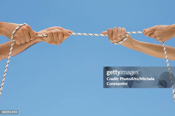 Two Hand Rope Pull 190 Two Hands Pulling A Rope Stock Photos, High-Res Pictures, and ...