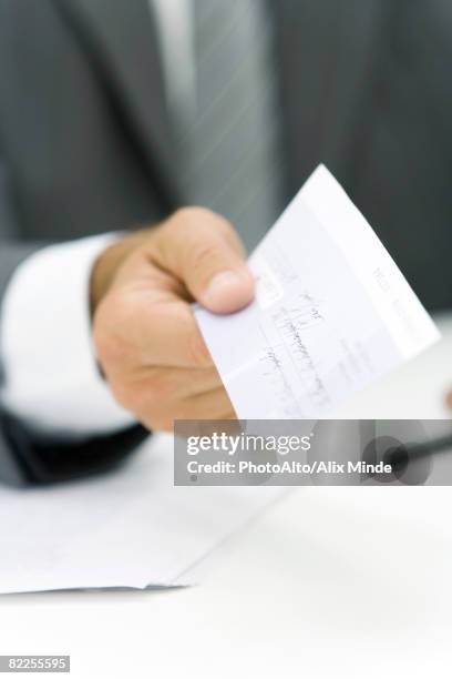 Hand Giving Check Photos and Premium High Res Pictures - Getty Images