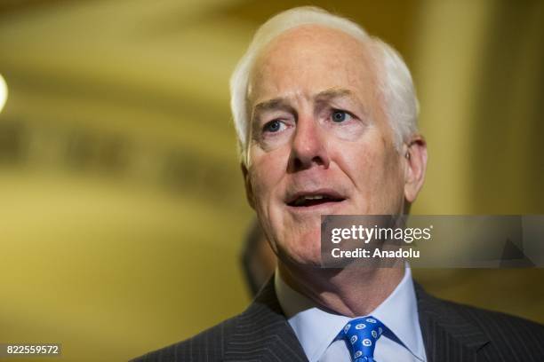 Senator John Cornyn speaks after the Senate narrowly passed the Procedural Vote for the replacement of the Affordable Care Act at the U.S. Capitol in...