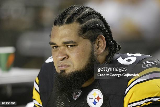 Offensive lineman Chris Kemoeatu of the Pittsburgh Steelers looks on from the sideline during a preseason game against the Philadelphia Eagles at...