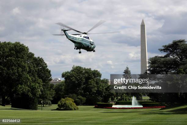 With President Donald Trump on board, Marine One lifts off from the South Lawn while departing the White House July 25, 2017 in Washington, DC. Trump...