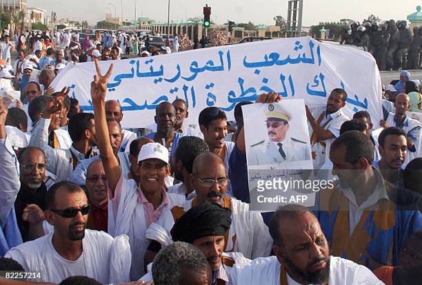 Thousands of people take part in a march to support the military junta on August 11, 2008 in Nouakchott. Mauritania's military junta came under...