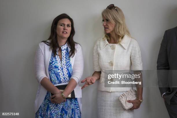 Sarah Huckabee Sanders, White House press secretary-designate, left, speaks with Kellyanne Conway, senior advisor to U.S. President Donald Trump,...