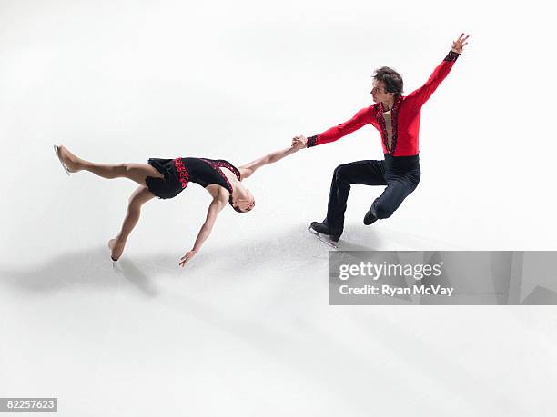 Model and Property Released: Figure skating pair performing a death spiral.