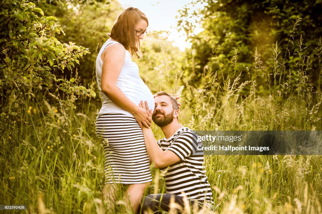 Beautiful young couple in nature.