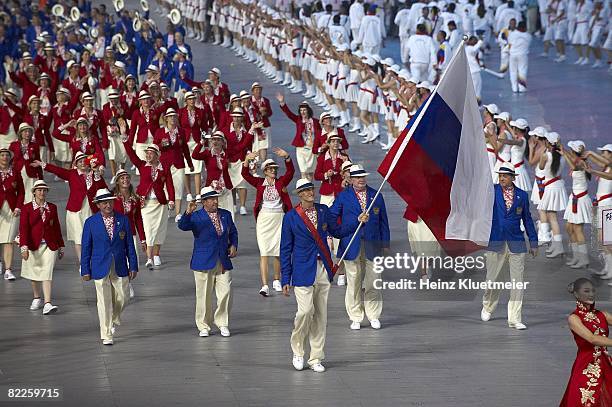 Summer Olympics: Team Russia national flag bearer Andrei Kirilenko with delegation during athlete procession at National Stadium . Beijing, China...