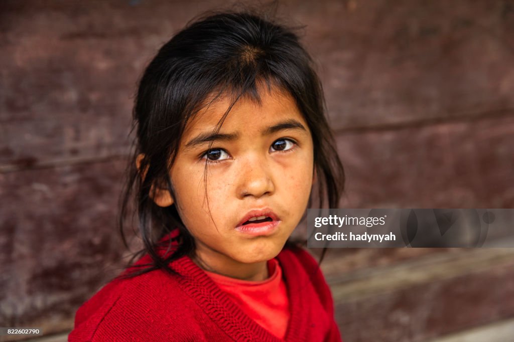 Nepali schoolgirl  in village near Annapurna Range