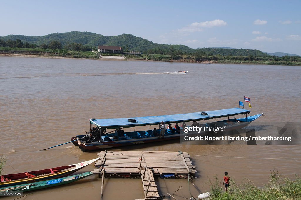 Boat on Mekong River, taken from Laos to Thailand on the opposite bank, Laos, Indochina, Southeast Asia, Asia
