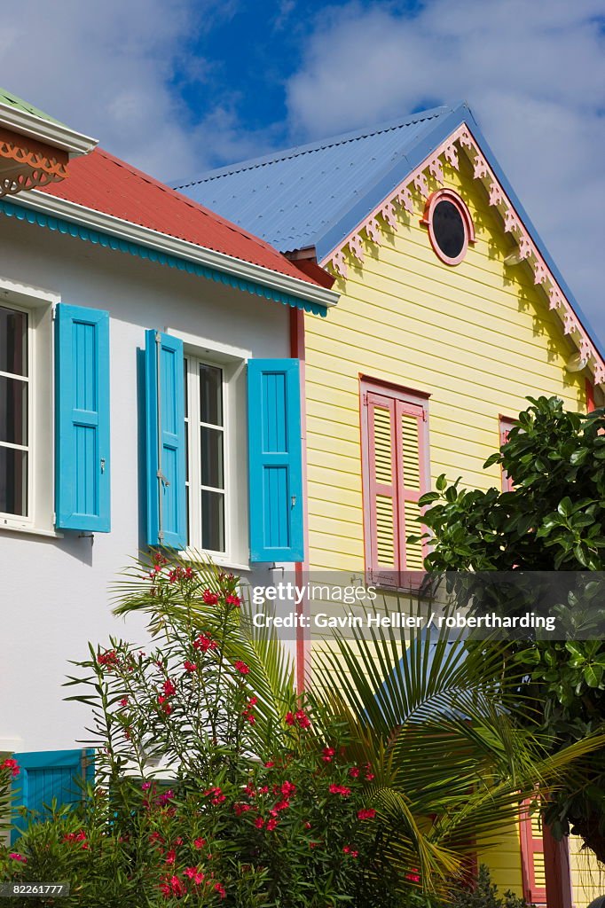 Colourfully painted buildings at Orient Beach, St. Martin (St. Maarten), Leeward Islands, West Indies, Caribbean, Central America