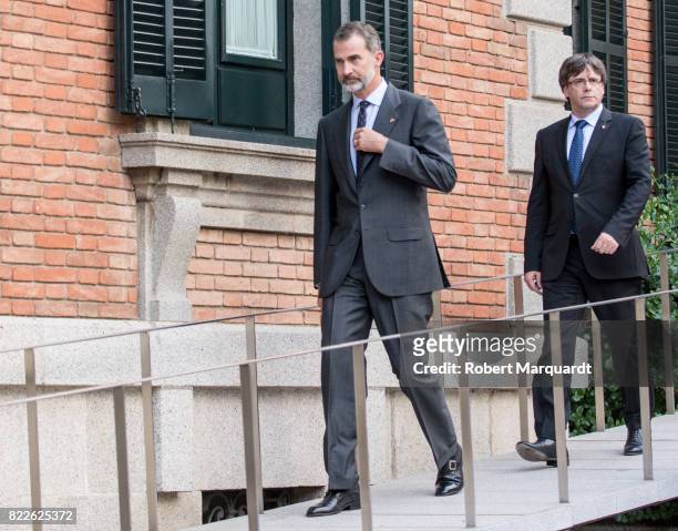 King Felipe VI of Spain and President of Catalunya Carles Puigdemont attend the 25th anniversary of the Barcelona Olympics at the Palacete Albeniz on...