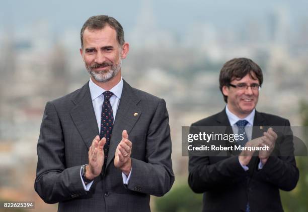 King Felipe VI of Spain and President of Catalunya Carles Puigdemont attend the 25th anniversary of the Barcelona Olympics at the Palacete Albeniz on...