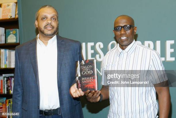 Wesley Snipes and Ray Norman sign copies of their new book "Talon Of God" at Barnes & Noble Tribeca on July 25, 2017 in New York City.