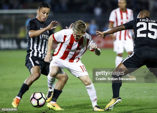 Marko Marin of Olympiacos in action against Everton and Leonardo of Partizan during the UEFA Champions League Qualifying match between FC Partizan...