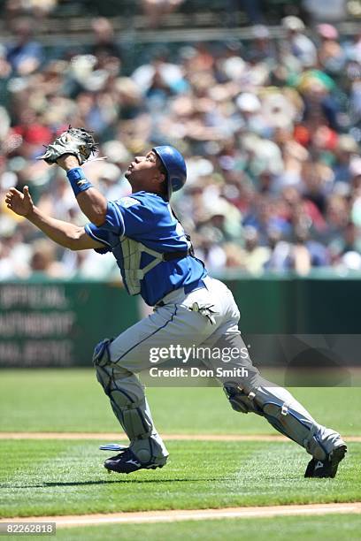 Miguel Olivo of the Kansas City Royals fields during the game against the Oakland Athletics at the McAfee Coliseum in Oakland, California on July 30,...