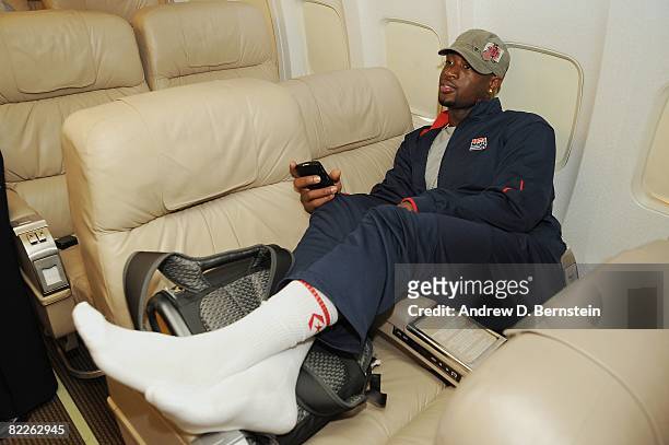 Dwyane Wade of the USA Basketball Men's Senior National Team relaxes while the team travels to the 2008 Beijing Summer Olympics on July 26, 2008 in...