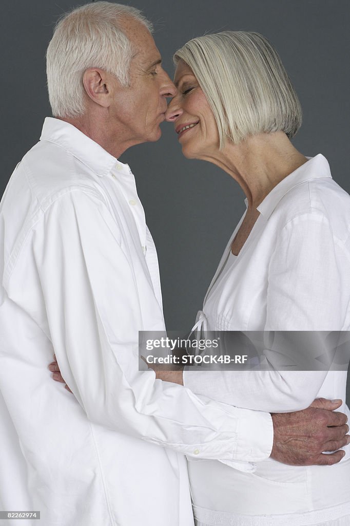 Kissing old couple