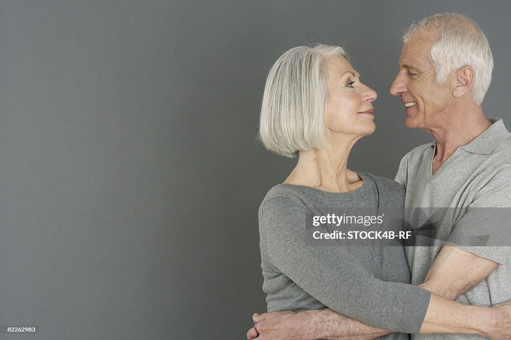 Embracing senior couple