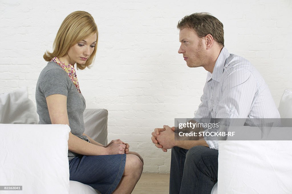 Couple sitting vis-a-vis