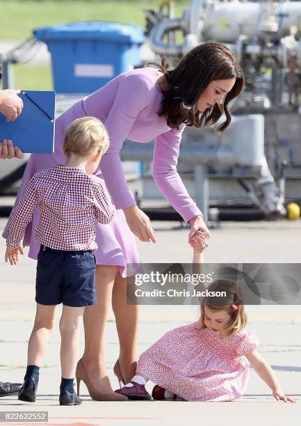 Prince William, Duke of Cambridge, Catherine, Duchess of Cambridge, Prince George of Cambridge and Princess Charlotte of Cambridge view helicopter...