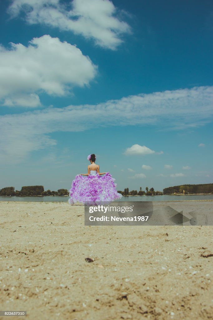 Fashion picture of the bride on the beach