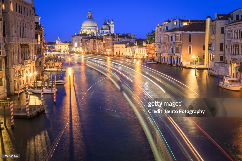 Italy, Venice, night view of canal in city