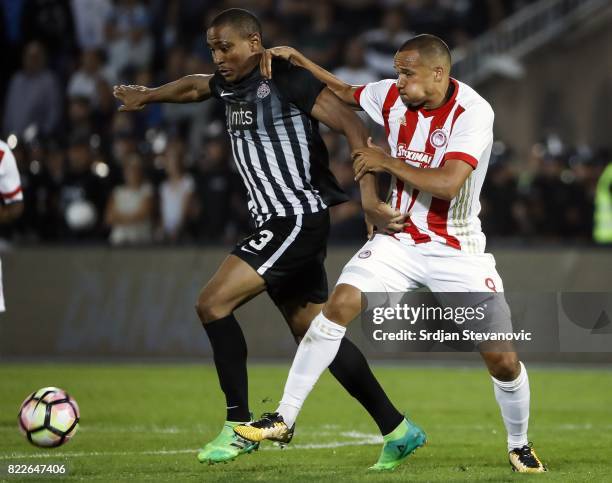 Leandre Tawamba of Partizan in action against Vadis Odjidja of Olympiacos during the UEFA Champions League Qualifying match between FC Partizan and...