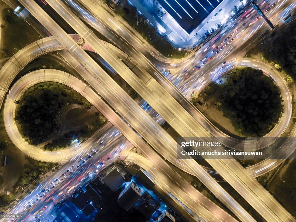 Interchange Highway traffic beautiful at Night, Bird Eye View in bangkok , top view , Bangkok , Thailand .