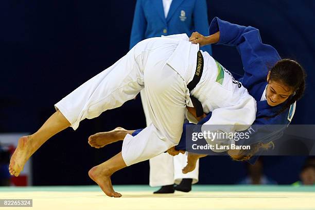 Silulu A'Etonu of American Samoa throws down Anna von Hariner of Germany in the women's half middleweight 63kg preliminary match at the University of...