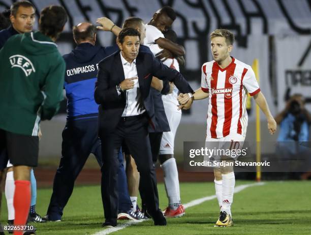 Head coach Besnik Hasi of Olympiacos give instructions to the Marko Marin during the UEFA Champions League Qualifying match between FC Partizan and...