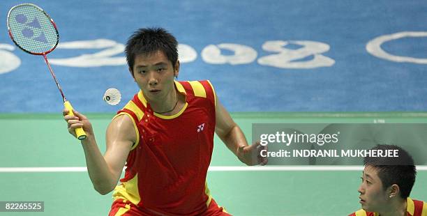 He Hanbin and Yu Yang of China play against Anthony Clark and Donna Kellogg of Great-Britain in the mixed doubles round of 16 badminton match of the...