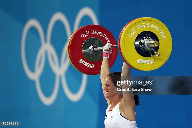 Michaela Breeze of Great Britain competes in the weightlifting event held at the Beijing University of Aeronautics & Astronautics Gymnasium during...
