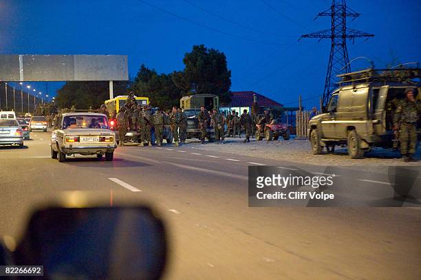 Georgian troops rush to evacuate from Gori along the highway towards Tbilisi on August 11, 2008 near Gori, Georgia. Georgian troops are withdrawing...