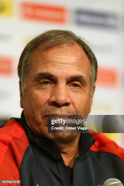 Bruce Arena coach of the USA looks on during the United States National Team press conference prior to the final match against Jamaica at Levi's...