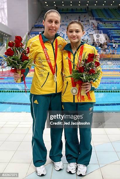Briony Cole and Melissa Wu of Australia pose with the silver medal during the medal ceremony for the Women's Synchronised 10m Platform held at the...