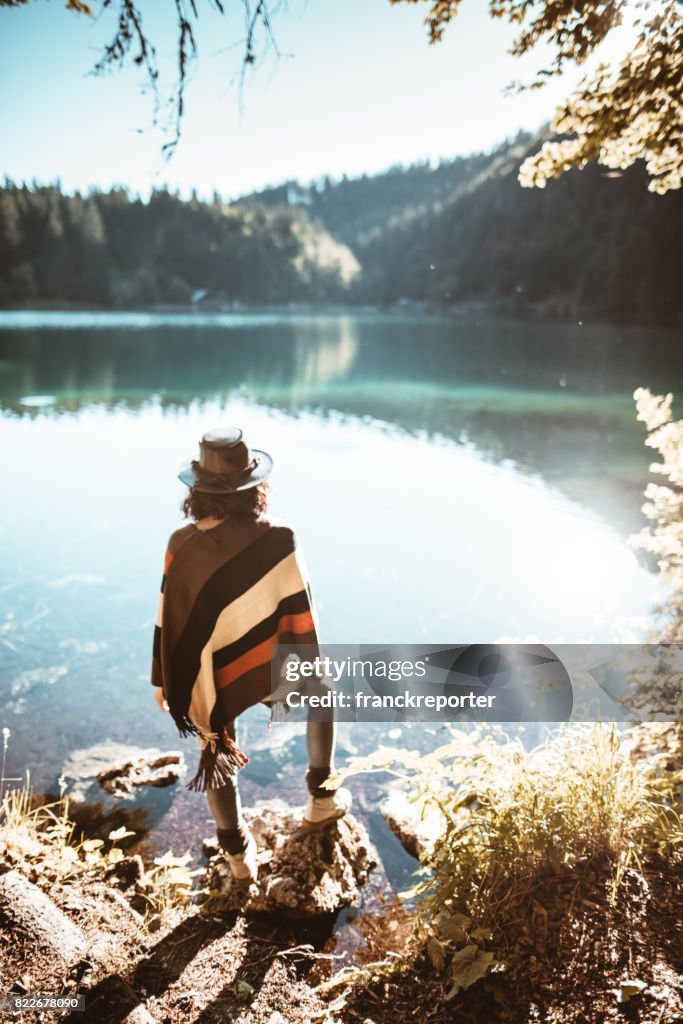 Woman standing in front of the lake