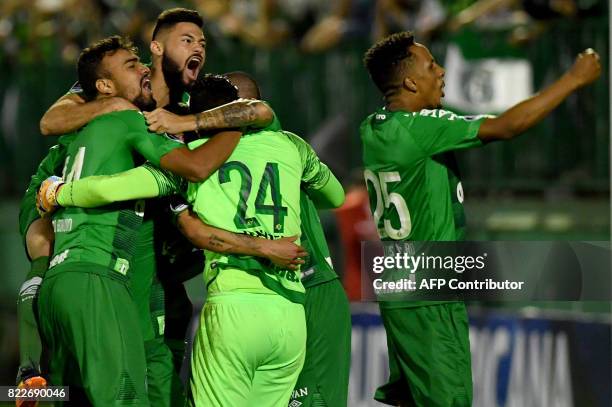 Brazil's Chapecoense footballers celebrate after defeating by penalty kicks against Argentina's Defensa y Justicia their 2017 Copa Sudamericana...