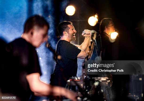 Atticus Ross, Trent Reznor and Robin Finck of Nine Inch Nails perform onstage on day 3 of FYF Fest 2017 at Exposition Park on July 23, 2017 in Los...