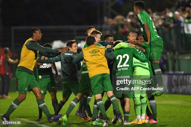 Brazil's Chapecoense footballers celebrate after defeating by penalty kicks against Argentina's Defensa y Justicia their 2017 Copa Sudamericana...