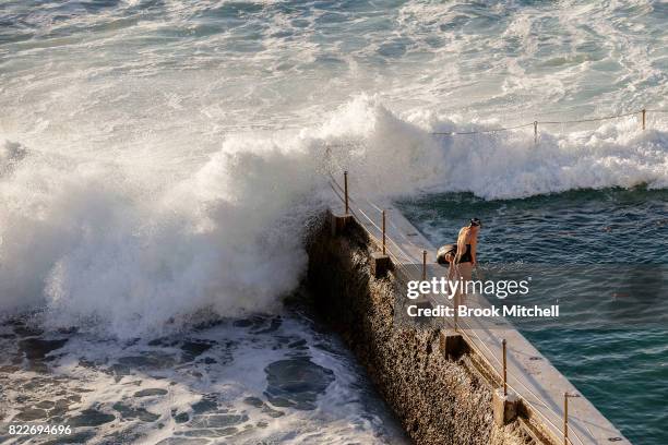 Swimmers enjoy the early morning sun at Bondi on July 26, 2017 in Sydney, Australia. Sydney is on track to have its warmest winter weekend in 27...