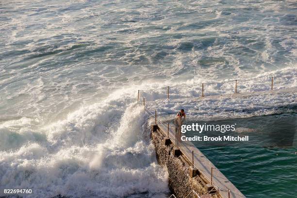 Swimmers enjoy the early morning sun at Bondi on July 26, 2017 in Sydney, Australia. Sydney is on track to have its warmest winter weekend in 27...