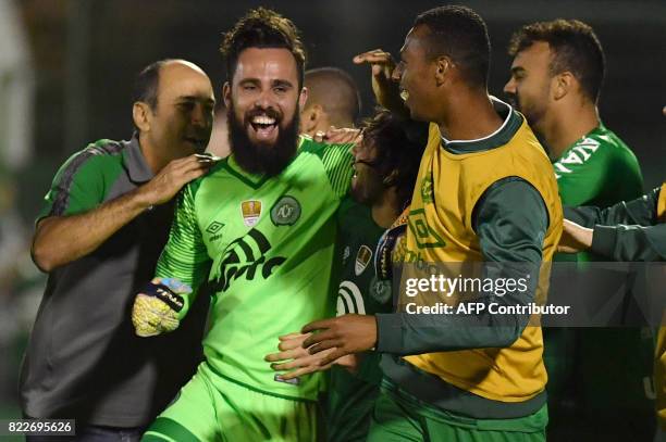 Brazil's Chapecoense goalkeeper Jandrei celebrates with teammates after defeating by penalty kicks Argentina's Defensa y Justicia in their 2017 Copa...