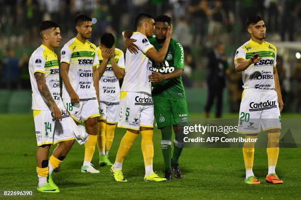 Argentina's Defensa y Justicia footballers show their disappointment upon losing by penalty kicks to Brazil's Chapecoense their 2017 Copa...