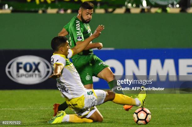 Arthur of Brazil's Chapecoense, vies for the ball with Luis Jerez of Argentina's Defensa y Justicia, during their 2017 Copa Sudamericana football...